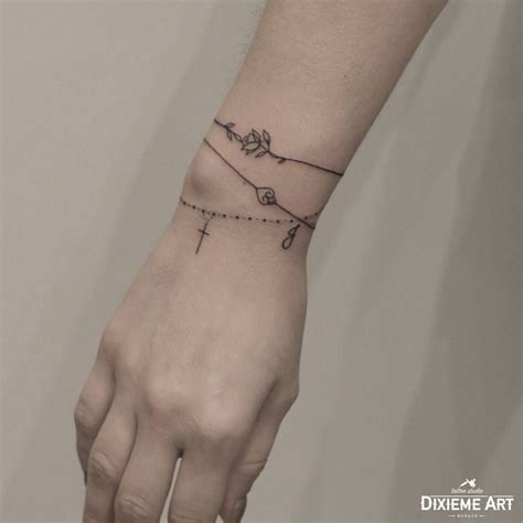 See more ideas about tiny tattoos, inspirational tattoos, tattoos. wrist charm bracelet tattoo - Google Search in 2020 ...