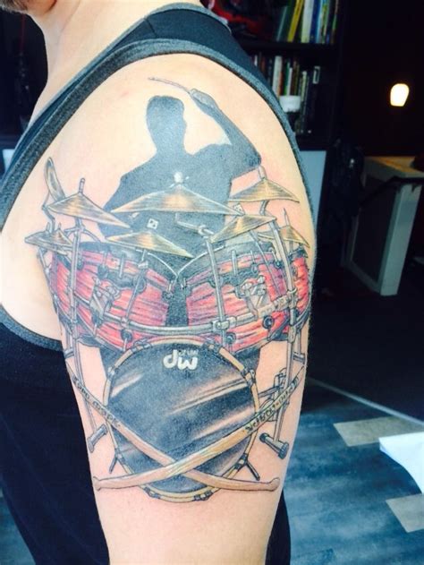 Former rose tattoo drummer paul demarco has pleaded guilty to a conspiracy to supply guns, including a machine pistol with a silencer, with former bikie boss hassan 'sam' ibrahim. Cover up tattoo of a drummer over a tribal and rose tattoo ...