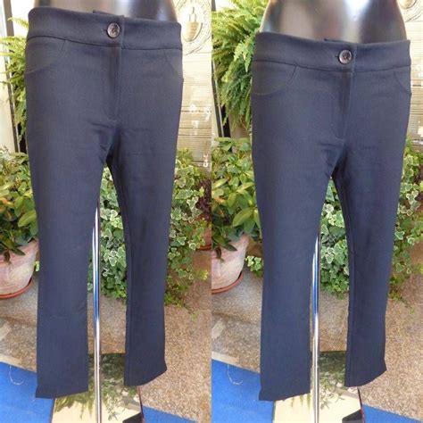 Un vasto assortimento per uno. (Pantalone nero elasticizzato con bottone) Taglia m che ...