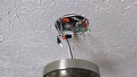 Ceiling fans are designed to rotate in reverse. Mark's Project Blog: Replacing a ceiling fan with a light ...