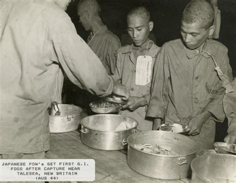 An old prisoner kept in the same cell as the protagonist. Emaciated Japanese prisoners of war wearing USMC uniforms ...