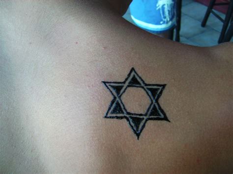 The first tattoo was a star of david on my right elbow. Star of David Tattoo - a gallery on Flickr