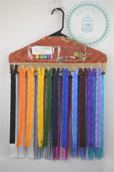Right now, they are all over the that room is amazing. Zipper Organizer | Sewing room organization, Sewing room ...