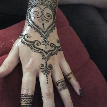 The henna tattoo is usually applied by a professional and initials are usually inserted somewhere in the henna design. A Henna Designs - 31 Photos & 12 Reviews - Henna Artists ...