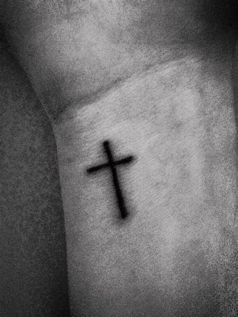 Having a cross tattoo on the wrist is a great way to have your faith seen, but not imposing. Small cross tattoo on wrist | I Wanted One | Pinterest