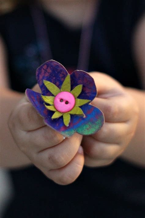 Toilet paper rolls scissors white glue stapler paint + brushes glitter laundry pins. {Oh-So Cute} Toilet Paper Roll Necklace