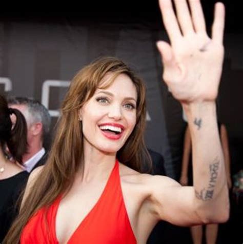 The celebrity has got 8 tattoos with numbers and words. Angelina Jolie Sexy Tattoos and their Meanings