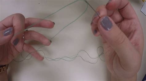 Instead of trying to push the tip of the thread through the eye of the needle as in the typical method,. How to Thread a Needle and Tie the Knot - YouTube