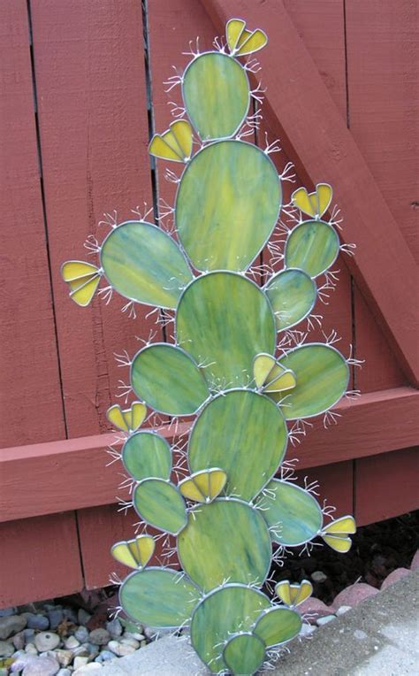 Did you know that the thanksgiving and christmas cacti are not true flowering can last up to 8 weeks or more if temperatures are kept around 68 degrees. mosaic cactus sculpture | Stained glass flowers, Stained ...