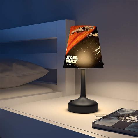Coloured light can be used to modify the atmosphere. Philips Star Wars X-Wing Fighter Portable LED Bedside and Table Lamp, Integrated LED, Battery ...