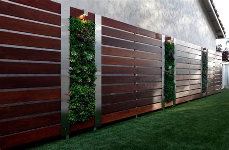 If your house has wood finishing, this is the best idea to implement in your garden. Think Green: 20 Vertical Garden Ideas