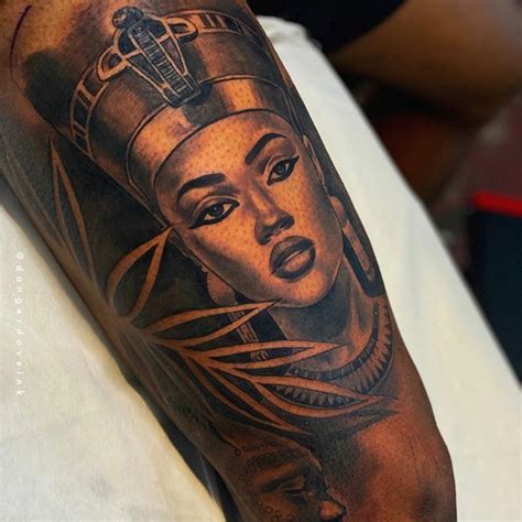 View little black ink queens crown tattoo below ankle. Queen Tattoo | Egyptian eye tattoos, Nefertiti tattoo, African sleeve tattoo