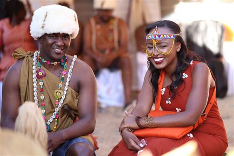 On the wedding night, the newlywed's room will be lit with a dragon and phoenix candle, and the new couple will drink wine from two cups tied together with a red string. Kikuyu Traditional Wedding | Grace & Moses Ngurario