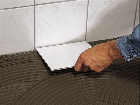 Terrassenplatten fliesen auf granulat drainplatten verklebt. Bodenfliesen verlegen und verfugen | BAUHAUS
