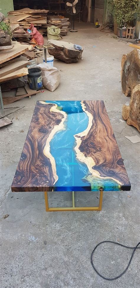 Antique epoxy resin wooden blue river coffee table. Blue river table top with epoxy inlay Senna siamea wood ...