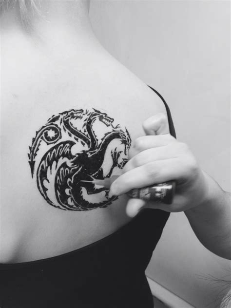 In tattoo art, dragonflies are also commonly used as a reference to living in the moment. Targarien dragon henna tattoo | Tattoos, Henna, Skull tattoo