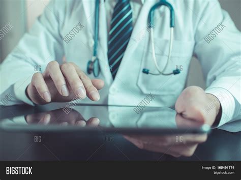 One (1) free trial per instagram account. Unknown Doctor Using Image & Photo (Free Trial) | Bigstock