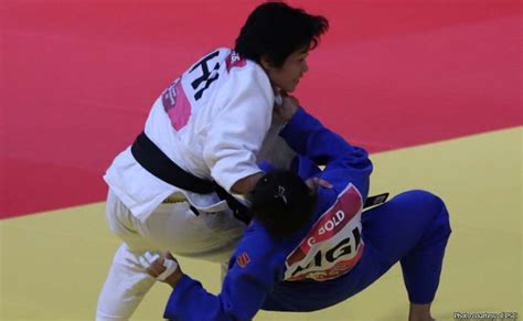 Kiyomi watanabe of the philippines (pinned down) found spain's cristina cabana perez too much to handle in the first round of judo competition. Unang pilak sa Asiad, nadale ni Watanabe