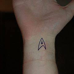 Amazing star trek inspired tattoo on full sleeve. Combadge tattoo (With images) | Star trek tattoo, Fandom ...