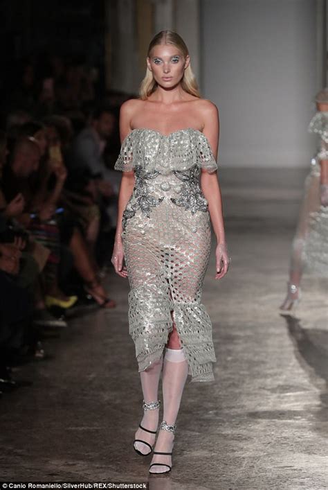 I prefer this coat to the coat you were wearing yesterday. Elsa Hosk wears a see-through dress at Milan Fashion Week ...