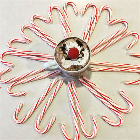 Adjustable wreath hangers are the best. Love this candy cane wreath, if you tape them together ...