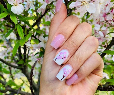 Use the same brush and white shade to give a depth to the blossoms by adding more short, white strokes in the middle of each blossom. Cherry Blossoms | Nails, Cherry blossom, Blossom
