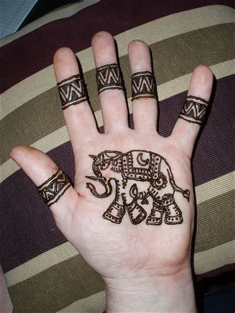 On the other hand, the use of henna tattoo has become somewhat famous in western countries as well. Asian elephant and tribal henna designs on palm | Henna ...