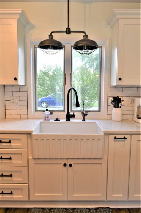 With over 80 years in cabinetry manufacturing, haas cabinet will bring your dream kitchen and/or bath to life. Goshen, IN. Haas Signature Country/Vintage White Kitchen and Laundry - Farmhouse - Kitchen ...