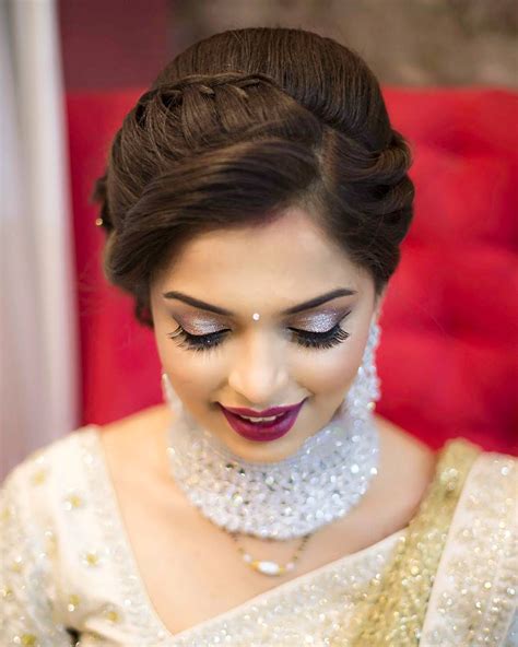 If you are not the one to wear heavy hair accessories and want to keep your hair as natural as this beautiful braided bun with a diamond tiara is a great bridal hairstyle inspiration for your wedding reception. Orange The Salon on Instagram: "I get happy to see my ...