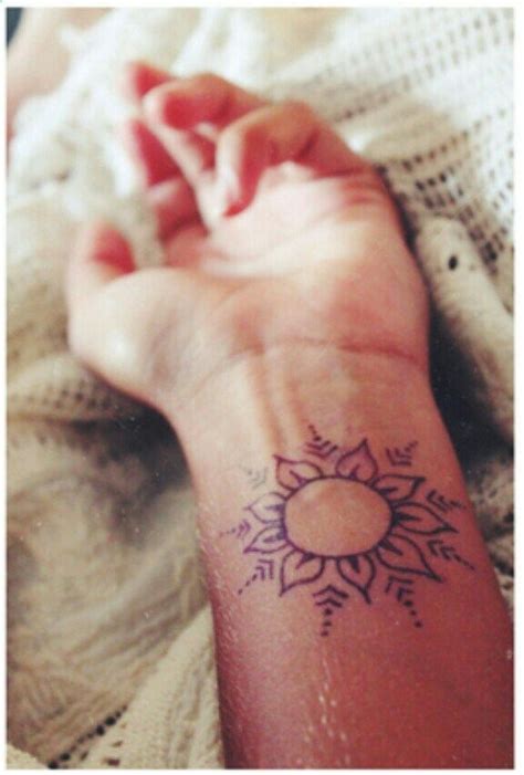 Check spelling or type a new query. Simple sun or flower wrist henna / tattoo design | Wrist henna, Henna tattoo designs, Henna tattoo