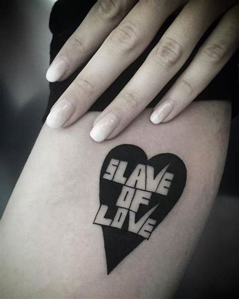 Essentially the idea that when you're a slave, you need something to show it. 'Slave of love' tattoo. Done in California on my friend