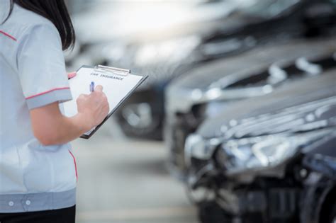 It doesn't seem like much but over time it can be quite substantial. Insurance agent staff writes on clipboard while checking the car after being evaluated and ...