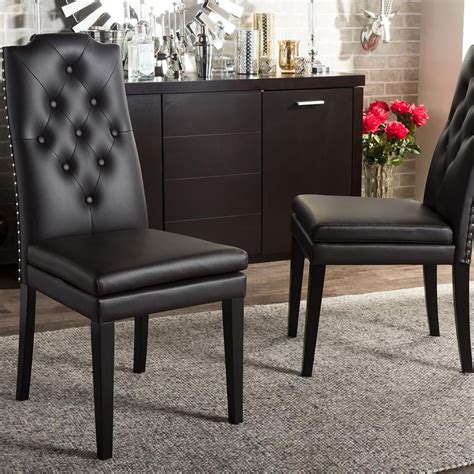 Thanks to the extra thick cushion covered in durable white faux leather, toulon dining chair will bring a sophisticated modern look to your dining room or kitchen space at an affordable price. Baxton Studio Dylin Brown Faux Leather Upholstered Dining ...