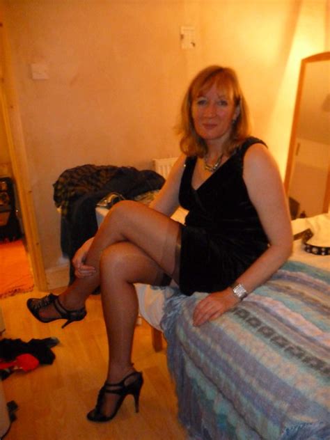 Redhead masturbates in sheer stockings and heels 6 min. Dark tan Nylons - by Bigtease