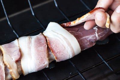Learn how to make a bacon wrapped pork tenderloin. How to Bake a 1.5 Pound Pork Tenderloin (with Pictures) | eHow