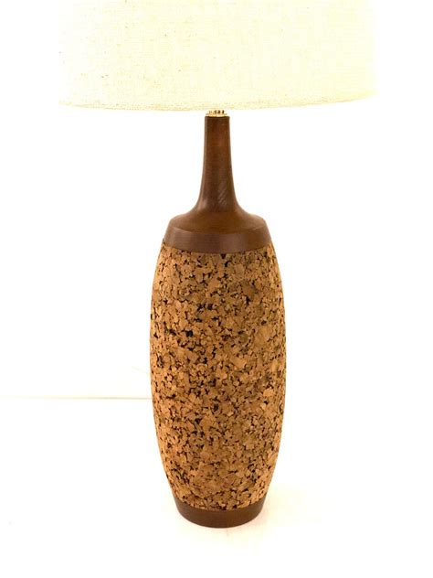 It measures 15 inches in diameter and is 9 inches tall. Pair of Majestic Cork Table Tall Lamps Atomic Age Original Lampshades For Sale at 1stdibs