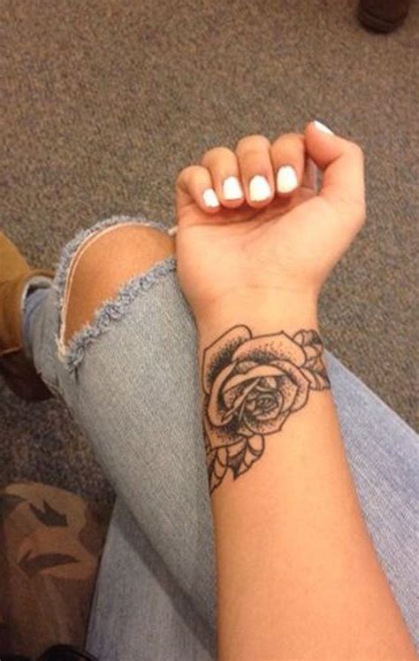 Visually appealing and best for styling, the white ink lace tattoos are slowly gaining momentum than the presence it had in the scenario a few years back. Small Tattoo White Ink | Rose tattoos on wrist, Wrist ...