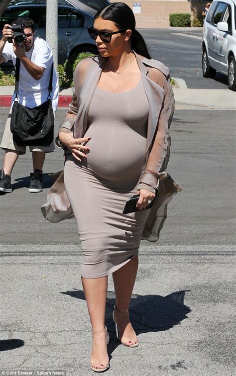 Good jeans from kim kardashian's pregnancy style. Kim Kardashian's heel buckles under the strain as pregnant ...