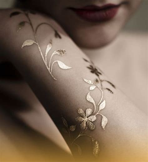 So no you cannot get a gold or silver tattoo. 81 Mesmerizing Glossy Metallic Ink Tattoo Designs