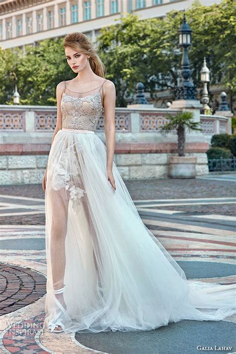 A stunning ivory calf length vintage inspired wedding dress with a soft champagne tulle overlay. 31 Ideas To Pull Off A Sexy Wedding Dress - Weddingomania