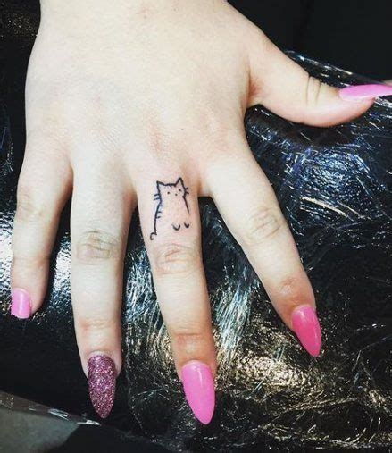 Small tiny black color cat tattoo design on finger. 53+ Ideas Tattoo Finger Cat Nail Art #tattoo (With images ...