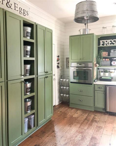 Medium tone paint colors bond well with the color tone of pickled cabinets. Green is Sherwin Williams 6194 #kitchenappliances ...