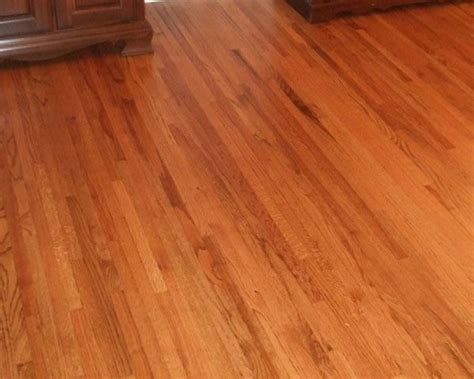 Red oak floors are some of the most common options available in hardwood floors because they combine rugged strength and durability with lots of grain and texture. red oak with early american stain | Purple carpet, Wood floors