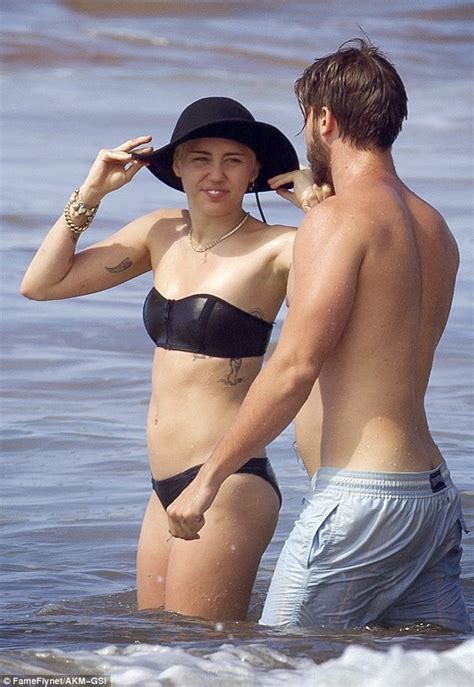 Maybe you would like to learn more about one of these? NUBDISH blogspot: PHOTOS: Bikini-clad Miley Cyrus showered ...