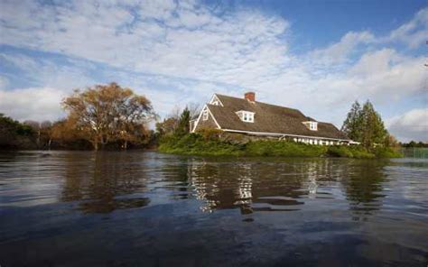 Covered with sand or containing sand: In PHOTOS: Catastrophic aftermath of Superstorm Sandy - Rediff.com News