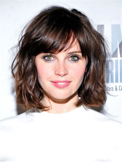 This flowing hairstyle looks best parted in the middle or to the side. Chin Length Wavy Human Hair Celebrity Bob Wigs With Bangs ...