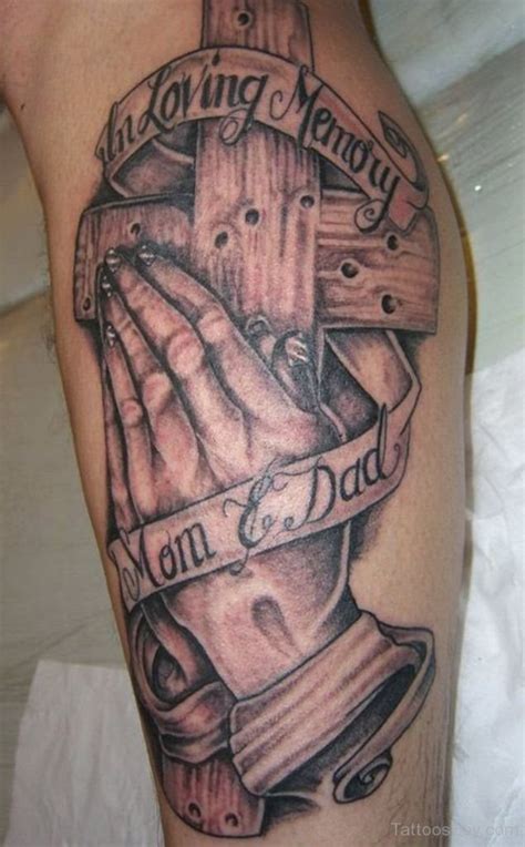 The pray hands on a bible. Praying Hands Tattoos | Tattoo Designs, Tattoo Pictures ...