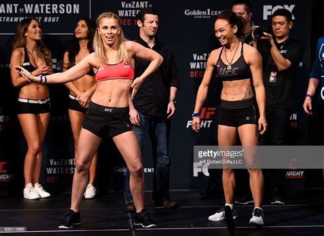 Michelle waterson doing the sprinkler. Paige VanZant and Michelle Waterson pose for photos during ...