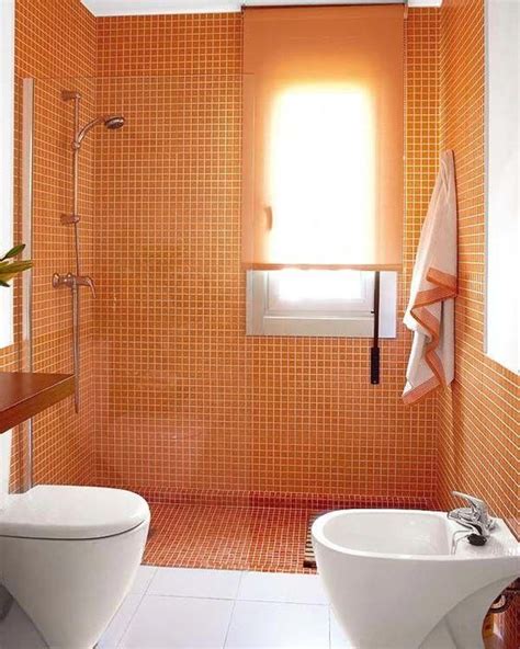 Orange shower curtains, window treatment ideas, small bathroom accessories, like floor rugs and towels, add soft and festive accents to neutral bathroom decor, creating simple and stylish decorating color schemes. 50 Cool Orange Bathroom Design Ideas - DigsDigs