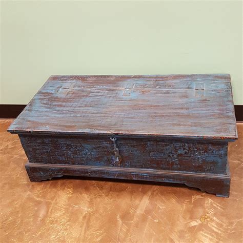 Fill it up with sofa blankets or use it as a coffee table. steamer trunk coffee table